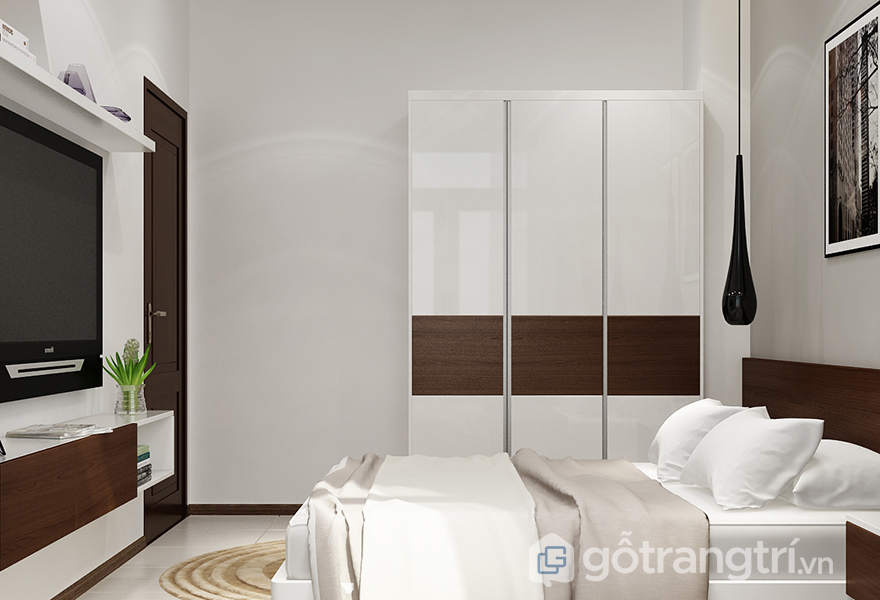 Một chiếc tủ quần áo nhỏ xinh với màu sắc nhã nhặn thích hợp với căn phòng theo phong cách đương đại