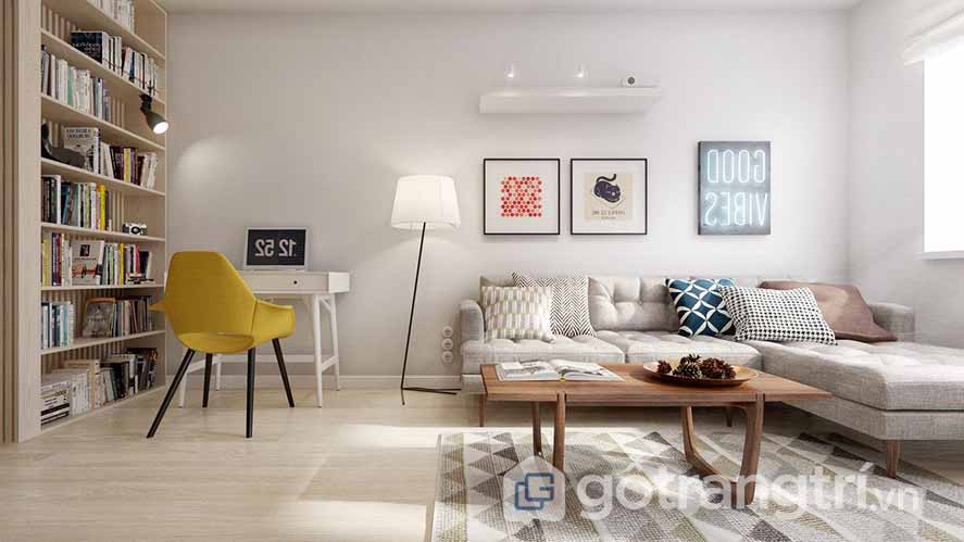 Ý TƯỞNG ĐẦY MÊ HOẶC: THIẾT KẾ PHONG CÁCH RETRO NỘI THẤT VẠN NGƯỜI MÊ — GỖ TRANG TRÍ CĂN PHÒNG KHÁCH NÀY ĐƯỢC TRANG TRÍ KHÁ GIẢN ĐƠN, VỚI GHẾ NGỒI MÀU VÀNG, GHẾ SOFA MÀU XÁM, VÀ THẢM TRẢI HỌA TIẾT KHÁ BẮT MẮT (ẢNH: INTERNET)