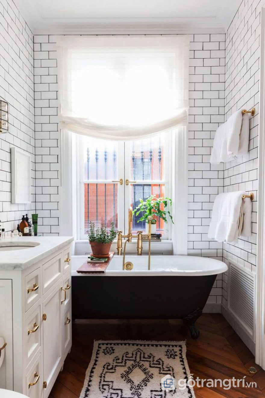 Gạch ốp màu trắng viền đen và thảm trải họa tiết đặc trưng trong phong cách thiết kế Art Deco (Ảnh: Internet)