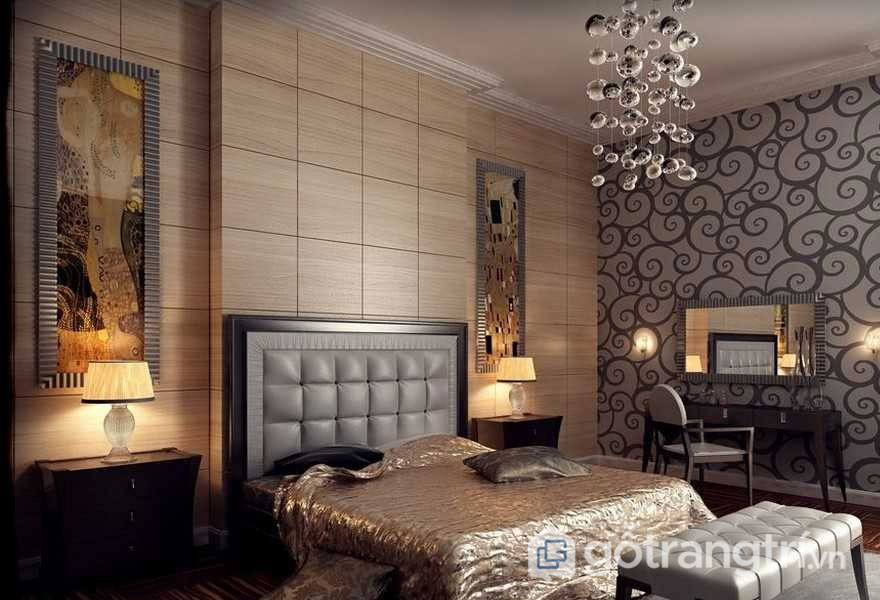 PHONG CÁCH NỘI THẤT ART DECO - SỨC QUYẾN RŨ KHÔNG THỂ CHỐI TỪ — GỖ TRANG TRÍ PHÒNG NGỦ MANG PHONG CÁCH NỘI THẤT ART DECO RỘNG LẪY VỚI DÒNG TRANH TREO TƯỜNG NGHỆ THUẬT, GA TRẢI GIƯỜNG VÀNG BÓNG (ẢNH: INTERNET)